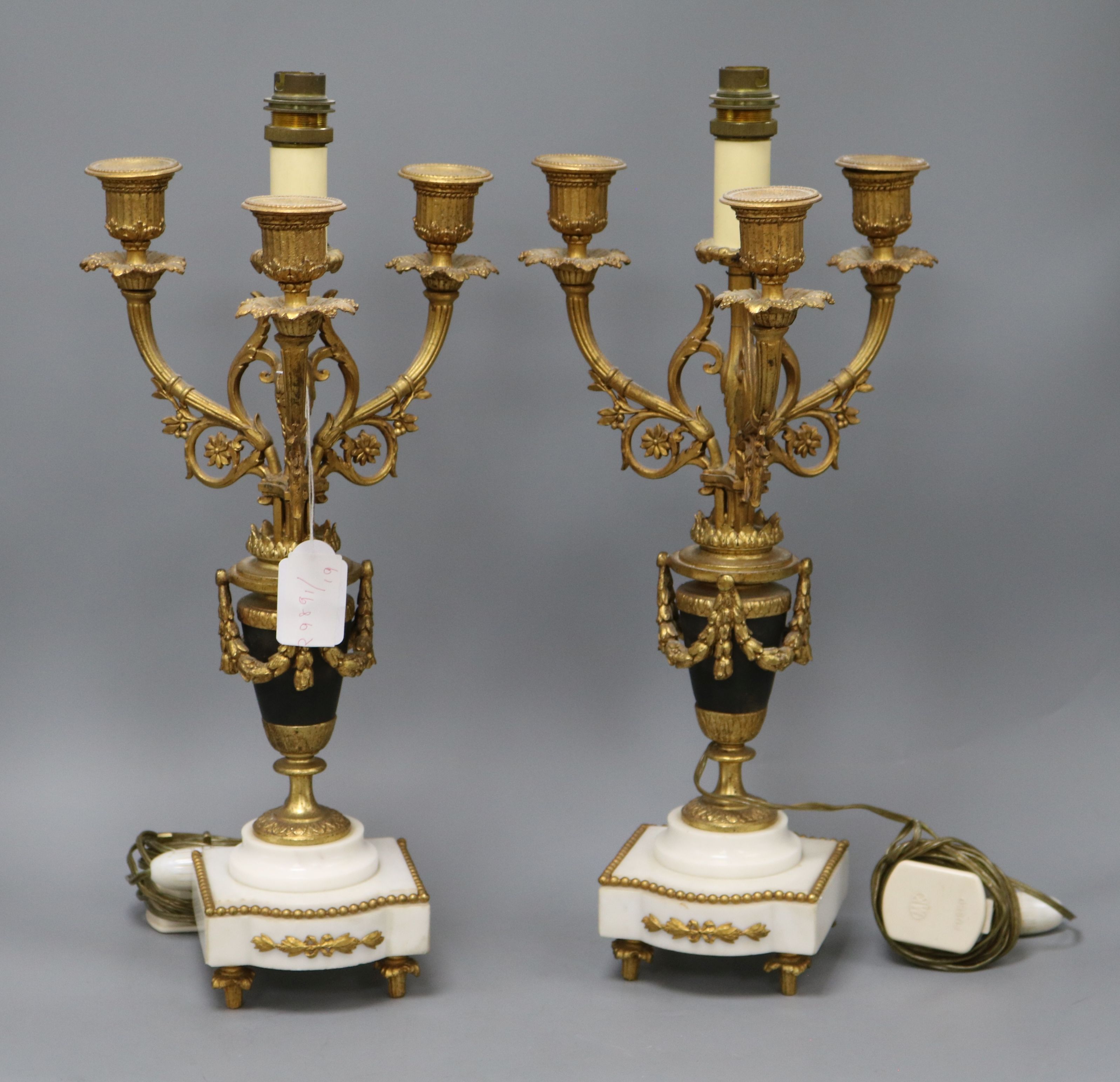 A pair of Regency style ormolu table lamps 44cm high