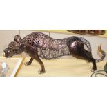 A metal leopard sculpture length 87cm