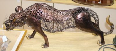 A metal leopard sculpture length 87cm