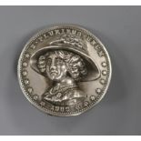 SUFFRAGETTE INTEREST: An Edwardian silver circular hat pin head, decorated with the bust of Emmeline