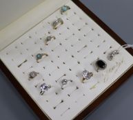 Ten assorted modern 9ct gold dress rings, with ring display box.