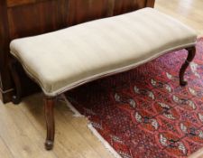 A Victorian mahogany stool W.111cm