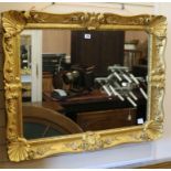 A carved giltwood hall mirror W.100cm