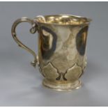 A Britannia standard silver christening mug by Garrard & Co, London, 1953, 6 oz.