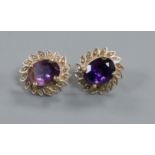 A pair of 9ct gold and oval amethyst ear studs.