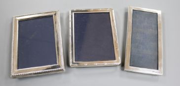An Edwardian silver mounted photograph frame, Birmingham, 1905 and two later silver mounted