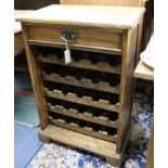 An oak wine cabinet W.60cm