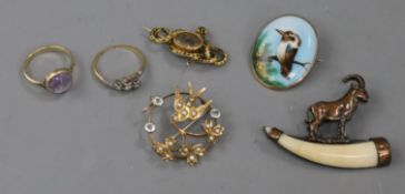 An early Victorian yellow metal mourning brooch, two rings, two pendants, two brooches and a