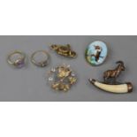 An early Victorian yellow metal mourning brooch, two rings, two pendants, two brooches and a