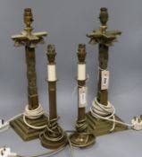 A pair of brass column table lamps and shades and another pair of table lamps and shades tallest