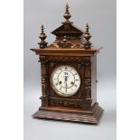 A walnut mantel clock height 56cm