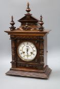 A walnut mantel clock height 56cm