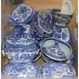 A collection of small blue and white tureens and covers