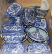 A collection of small blue and white tureens and covers