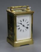 A brass cased carriage clock