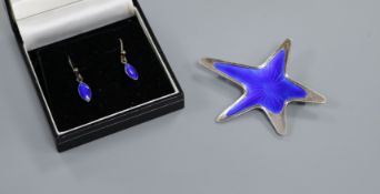 A Danish sterling and enamel star brooch by Meka and a pair of earrings.
