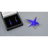 A Danish sterling and enamel star brooch by Meka and a pair of earrings.