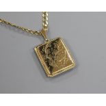 A modern 9ct gold locket, on a 9ct gold chain, locket 31mm.