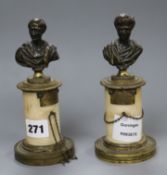 A pair of early 19th century bronze busts on plinths 17cm high