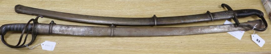 A Victorian sabre with etched blade and a mid 19th century sabre, both with scabbards