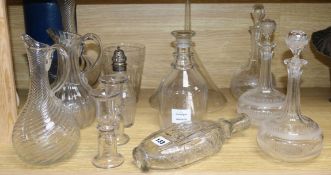 A quantity of cut glass jugs, decanters, etc.