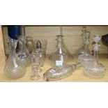 A quantity of cut glass jugs, decanters, etc.