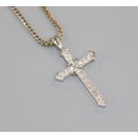 A 9ct white gold and diamond set cross pendant on an 18ct white gold chain, pendant 25mm.