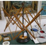 A mid 19th century wool winder in brass and boxwood