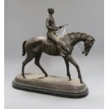 After Bonheur. A bronze jockey and rider height 40cm