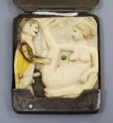 A steel and celluloid match holder with erotic interior