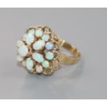 A modern 18ct gold and opal cluster dress ring, size M.