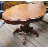 A Victorian serpentine mahogany centre table W.112cm