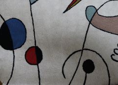 An Indian chain stitch rug with a Jean Miro style design