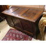 A 17th century oak coffer W.129cm