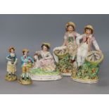 A pair of Staffordshire fisherfolk, another pair and girl seated with goat Tallest 21cm