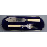 A cased pair of Edwardian silver fish servers by William Hutton & Sons, London, 1905.
