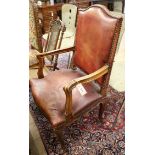 A leather seated French elbow chair