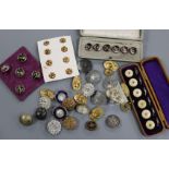 A collection of mixed buttons including French enamel, cased sets etc