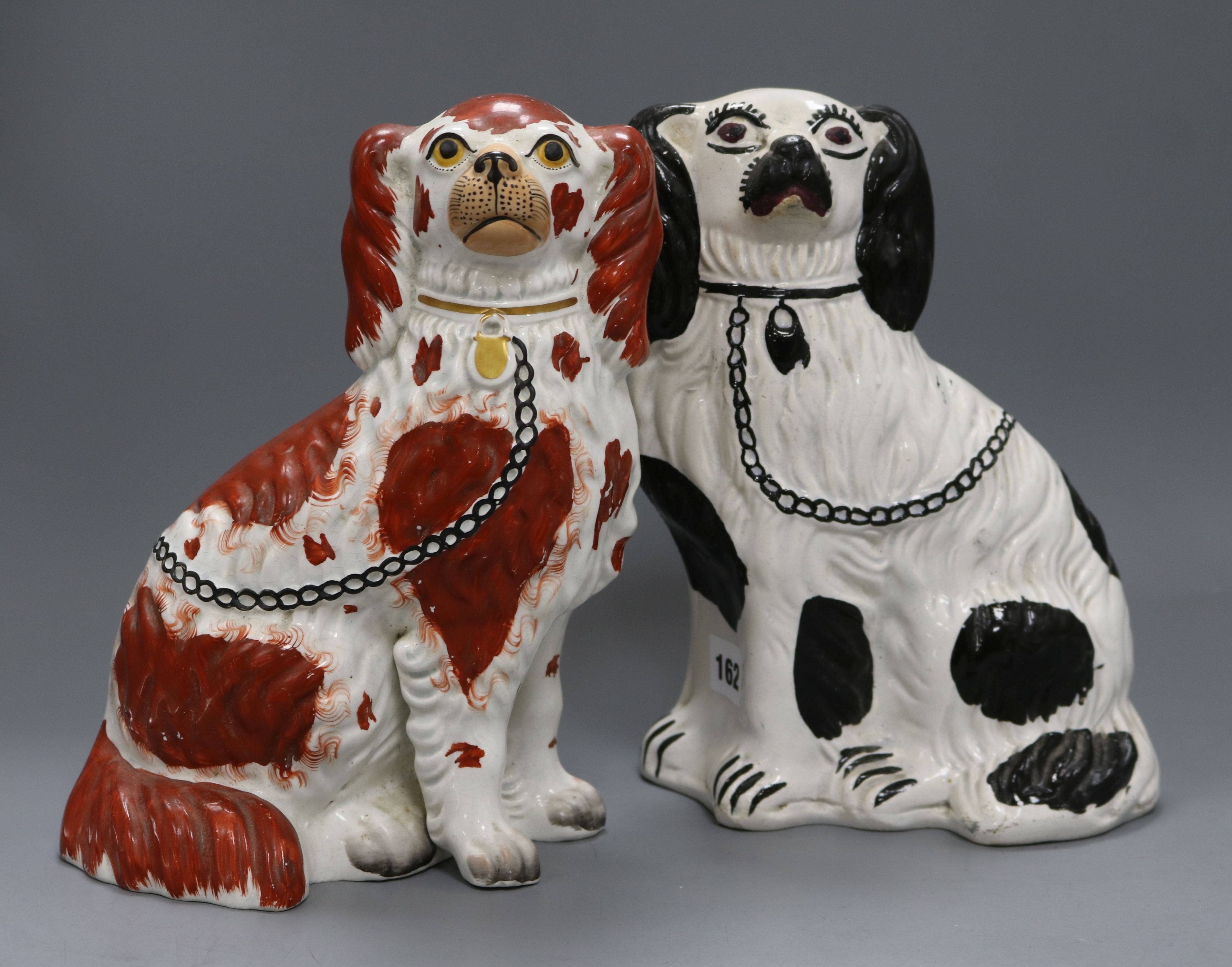 Two Staffordshire dogs height 26.5cm