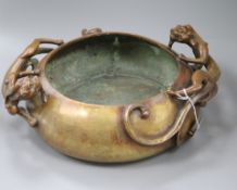 A large Chinese bronze 'dragon' censer, Xuande mark length 38cm