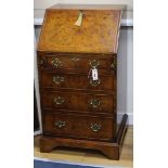 A walnut bureau W.56cm