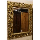 A Florentine framed mirror W.63cm