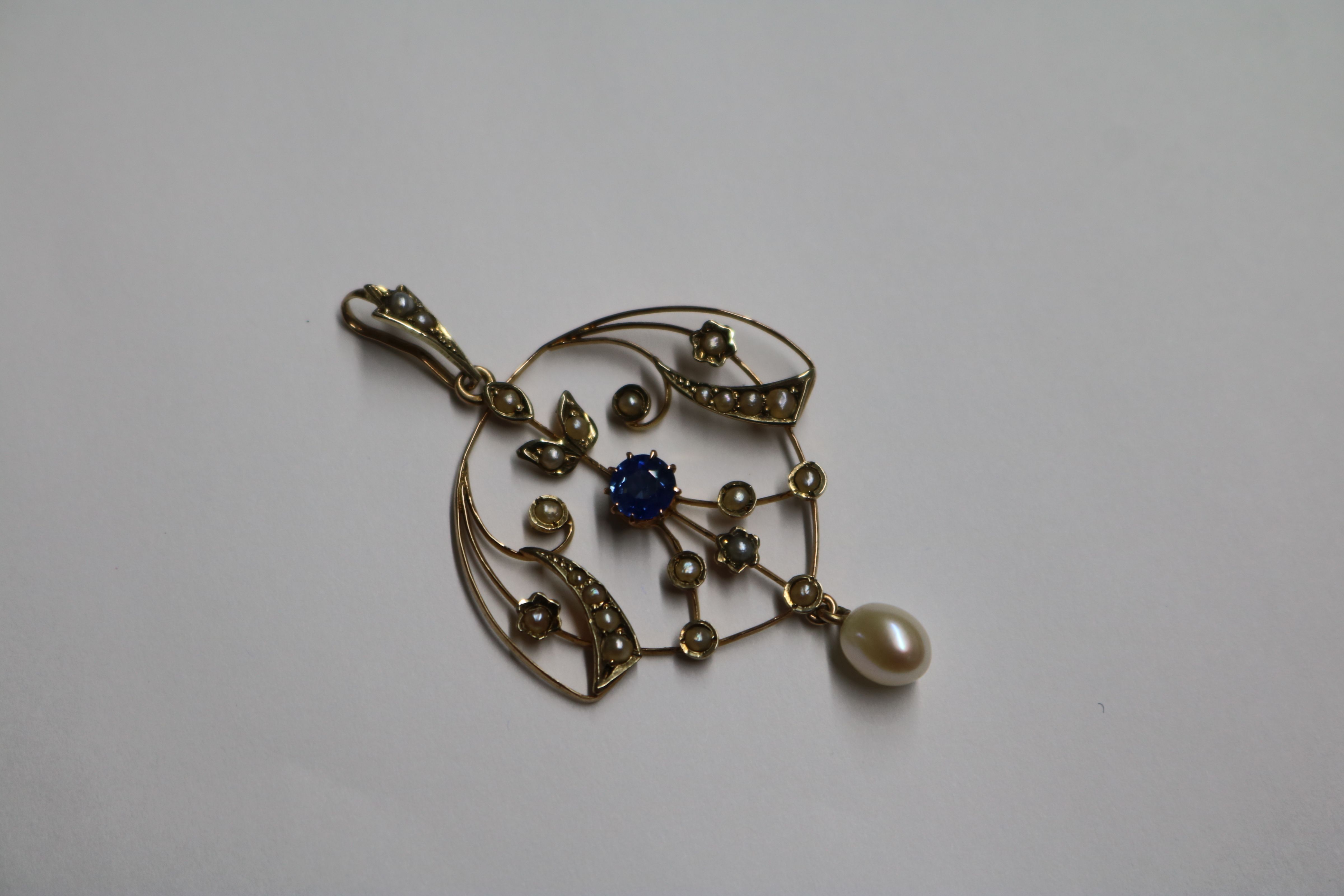 An Edwardian 9ct gold, sapphire and seed pearl set drop pendant, 36mm. - Image 2 of 5