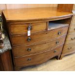 A Regency bow front chest of drawers (one top drawer missing) W.101cm