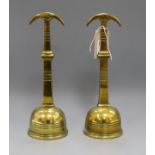 A pair of 19th century brass doorstops
