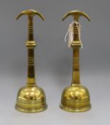 A pair of 19th century brass doorstops