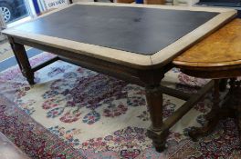 A large oak library table W.231cm