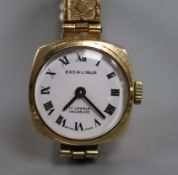 A lady's 9ct gold Excalibur manual wind wrist watch.