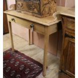 An early 19th century pine washstand W.95cm
