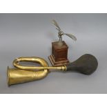 A vintage brass car horn, No 14 and a dove car mascot